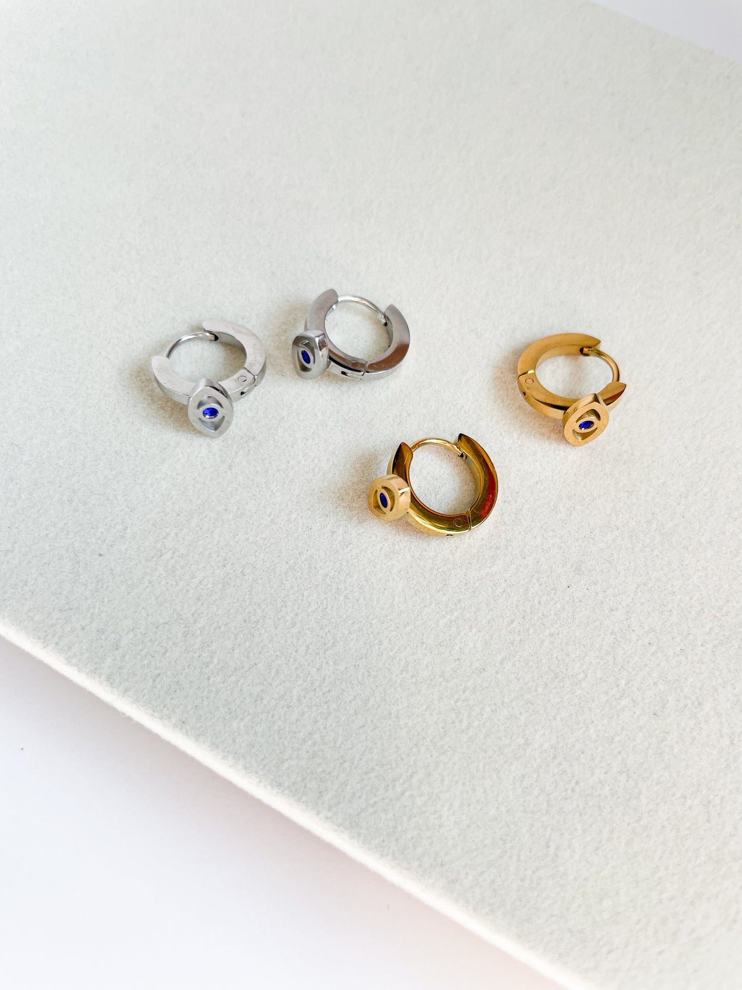 Обеци халки с око със син камък от медицинска стомана 316L